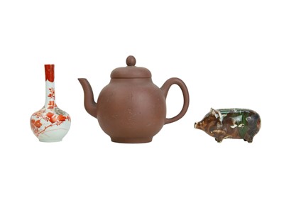 Lot 540 - A creamware piggy bank.