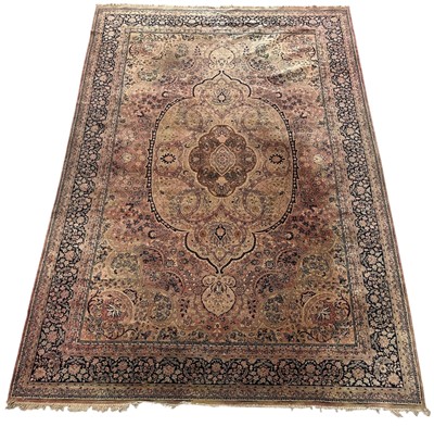 Lot 26 - A Large Islamic Carpet. The Carpet is...