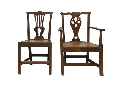 Lot 957 - A Georgian oak and elm carver chair.