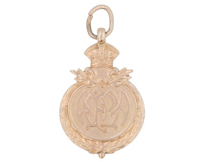 Lot 1093 - A 9k hallmarked rose gold Metropolitan Police medal watch fob.