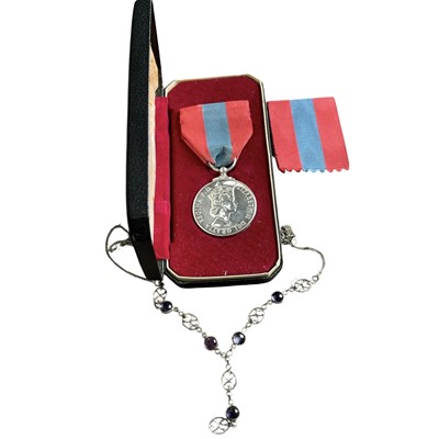 Lot 175 - A cased Imperial Service medal; together with...