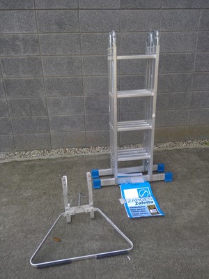 Lot 24 - A Multi-function Folding Ladder. The Ladder is...