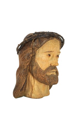 Lot 62 - A French carved wood head in the form of Jesus Christ.