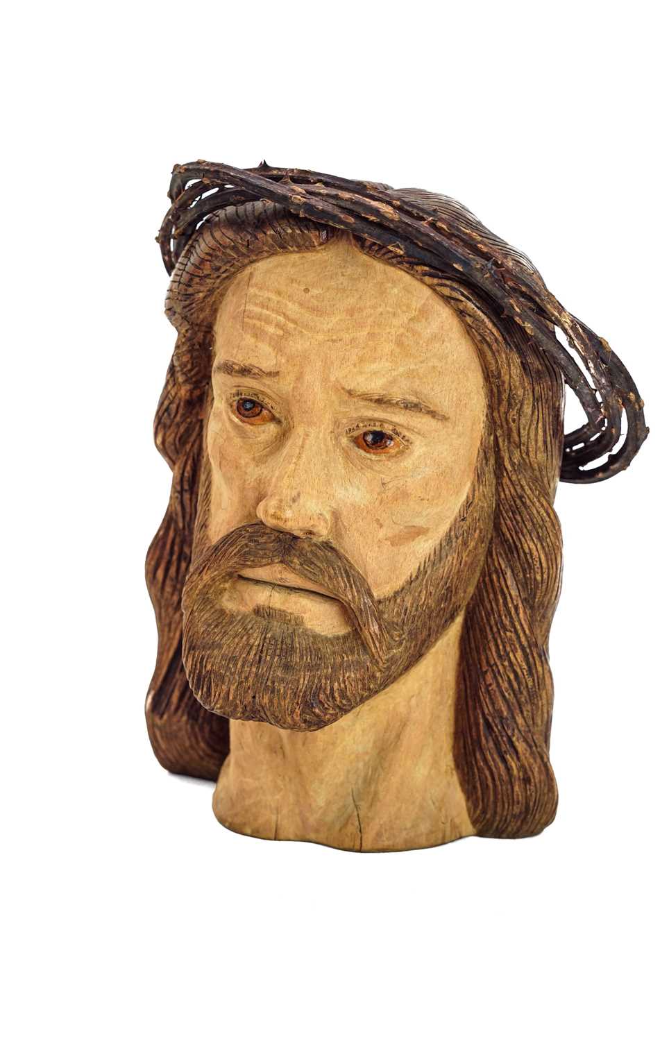 Lot 62 - A French carved wood head in the form of Jesus Christ.