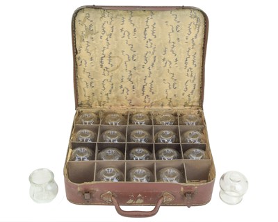 Lot 283 - A set of 20 French moulded glass cupping glasses.