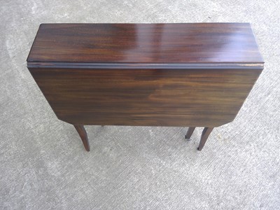 Lot 42 - A Sutherland Table. The Table is 69cm tall,...