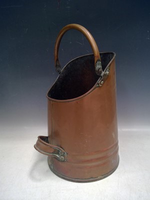 Lot 94 - A Copper Coal Scuttle. The Scuttle is 38cm...
