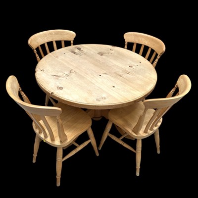 Lot 34 - A Beech Table and Four Chairs. The Table is...