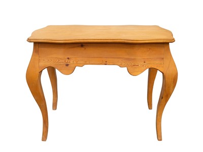 Lot 928 - A continental Pine and beech dressing table.