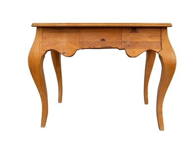 Lot 928 - A continental Pine and beech dressing table.