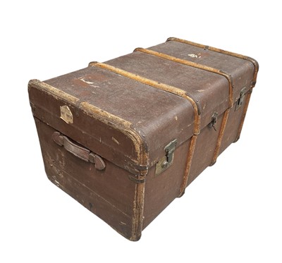 Lot 33 - An early 20th century steamer trunk with its...