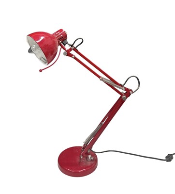 Lot 154 - A contemporary red anglepoise-style desk lamp.