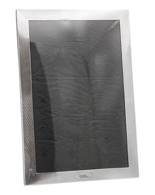 Lot 158 - A George V silver-mounted large rectangular photograph frame by Samuel M Levi.