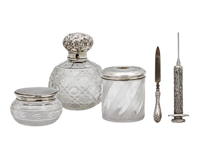Lot 157 - A selection of silver-mounted dressing table items.