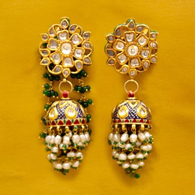 Lot 45 - A pair of traditional Indian 22k gold Karanphool Jhumka Kundan earrings.