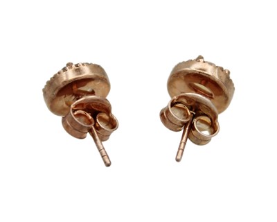 Lot 3 - A pair of silver gilt opal and diamond stud earrings.