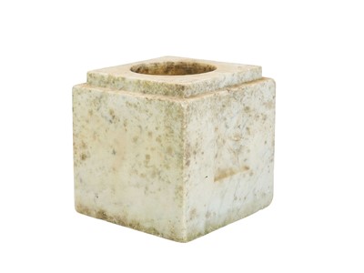 Lot 21 - A marble block vase with carved rose decoration.