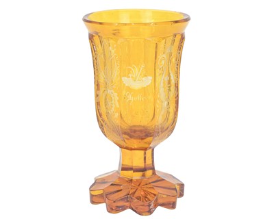 Lot 615 - An amber glass rummer or 'Friendship' glass, circa 1900.