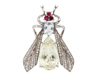 Lot 28 - A silver, yellow beryl, aquamarine, ruby, and diamond fly brooch/pendant.
