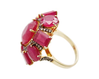Lot 40 - A large and impressive silver gilt ruby and diamond dress ring.