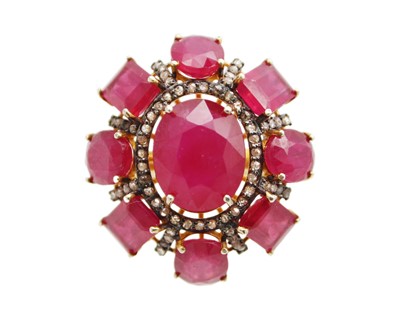 Lot 40 - A large and impressive silver gilt ruby and diamond dress ring.