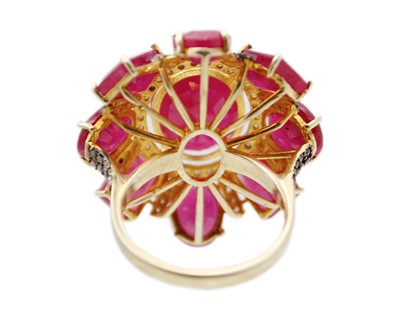 Lot 40 - A large and impressive silver gilt ruby and diamond dress ring.
