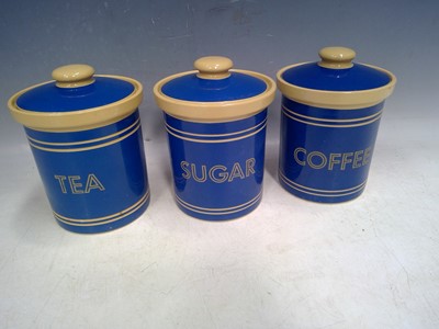 Lot 178 - Three lidded storage jars. The jars are 17cm...