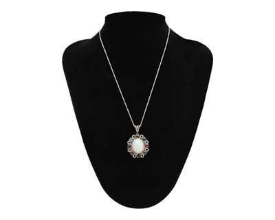 Lot 48 - A large silver, opal, tourmaline, and diamond pendant necklace.