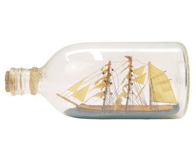 Lot 12 - Eight ships in bottles.