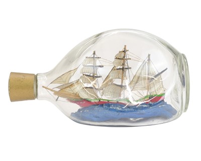 Lot 12 - Eight ships in bottles.