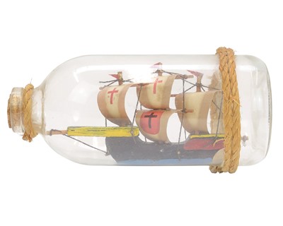 Lot 12 - Eight ships in bottles.