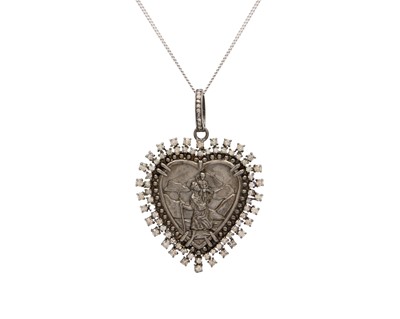 Lot 56 - A silver and diamond heart-shaped St. Christopher's pendant necklace.