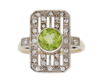 Lot 76 - An Art Deco-style 9k gold peridot and diamond ring.