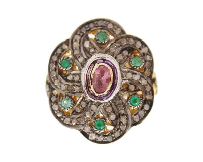 Lot 80 - A silver gilt, pink tourmaline, emerald, and diamond flower-shaped dress ring.