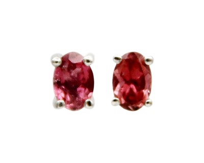 Lot 83 - A pair of silver tourmaline stud earrings.