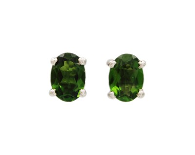 Lot 84 - A pair of silver chrome diopside stud earrings.