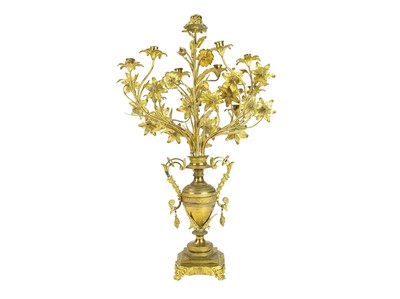 Lot 22 - A pair of ornate large French gilt metal candelabra.