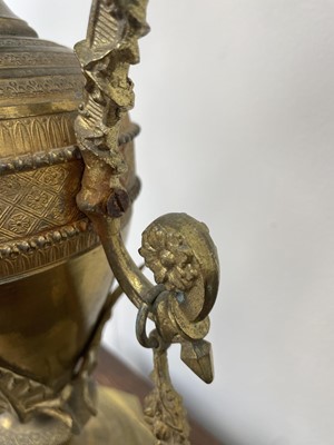 Lot 22 - A pair of ornate large French gilt metal candelabra.