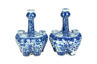 Lot 420 - A near pair of Chinese blue and white tulip vases.