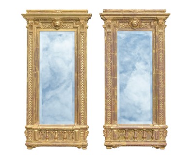 Lot 831 - A pair of gilt empire style wall mirrors.
