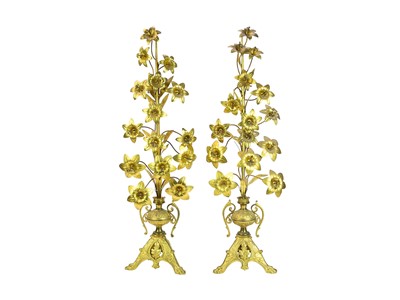 Lot 100 - A pair of gilt metal flower ornaments.