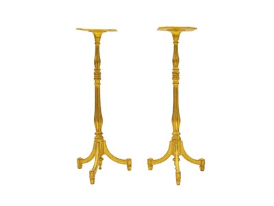 Lot 931 - A pair of giltwood torcheres.