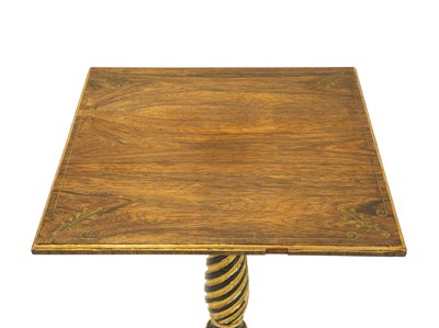 Lot 885 - A pair of Regency style rosewood, ebonised and gesso wine tables.