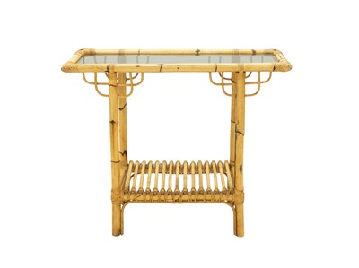Lot 868 - A glass top bamboo occasional table.