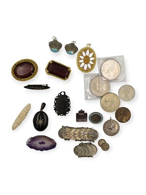 Lot 53 - A collection of costume jewellery with two badges and coins.