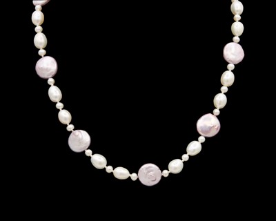 Lot 72 - A purplish-pink and white freshwater pearl necklace.