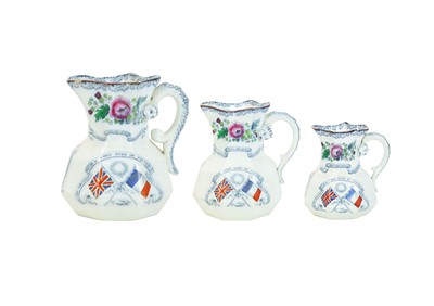 Lot 595 - A rare set of three graduated Crimean War commemorative ironstone jugs.