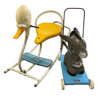 Lot 125 - A Rosebud Childs push-along Donkey and a Mobo...
