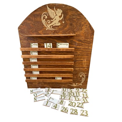 Lot 127 - A Perpetual calendar board with slide-in...