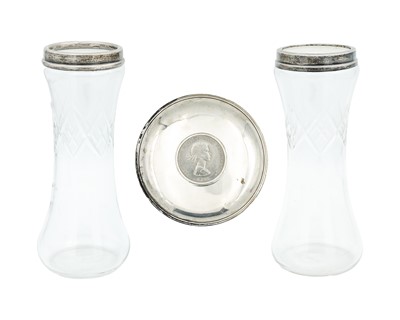 Lot 117 - A pair of George V silver-mounted cut glass vases and a Churchill crown coin set silver dish.